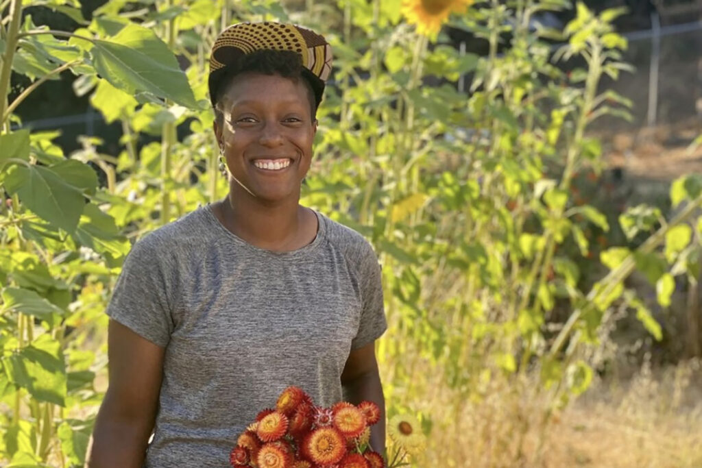 Picture of Ashlee Johnson, holding flowers